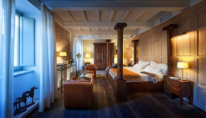 Гостиница Relais & Chateaux Palazzo Seneca  Норчиа